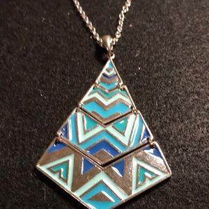 Silver color necklace with fun moving metal charm